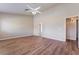 Bright bedroom showcasing hard surface floors and ceiling fan at 5586 Golden Leaf Ave, Las Vegas, NV 89122