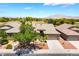 Charming single-story home featuring well-manicured landscaping, a three-car garage, and a welcoming entrance at 5586 Golden Leaf Ave, Las Vegas, NV 89122