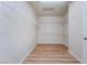 Spacious walk-in closet with wood floor and white wire shelving provides ample storage space at 5586 Golden Leaf Ave, Las Vegas, NV 89122