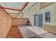 The backyard features a covered patio, sliding door entrance, and a concrete area at 6320 Desert Leaf St # 101, North Las Vegas, NV 89081