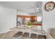 Modern kitchen with stainless steel appliances, granite countertops, and a convenient breakfast bar at 6320 Desert Leaf St # 101, North Las Vegas, NV 89081