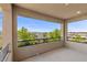 Spacious outdoor balcony offering expansive views of the neighborhood with well-maintained landscaping at 6338 Skystone St, Las Vegas, NV 89135