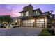 Stunning two-story home with a modern design, desert landscaping, and two-car garage at 6338 Skystone St, Las Vegas, NV 89135
