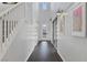 Bright foyer with a high ceiling, staircase, and stylish decor at 6338 Skystone St, Las Vegas, NV 89135