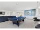 Spacious game room with a pool table, wet bar, and comfortable seating, perfect for relaxation and entertainment at 6338 Skystone St, Las Vegas, NV 89135