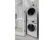 Efficient laundry area with stacked washer and dryer, maximizing space in a compact and functional design at 6338 Skystone St, Las Vegas, NV 89135