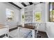 Bright home office with built-in shelving, desk space, and natural light at 6338 Skystone St, Las Vegas, NV 89135