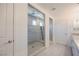 Modern bathroom featuring a glass-enclosed shower with a rainfall shower head at 6403 Ava Ridge Ave, Las Vegas, NV 89141
