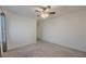 Spacious bedroom featuring carpet, ceiling fan, and neutral walls at 6403 Ava Ridge Ave, Las Vegas, NV 89141