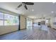 Open concept living room with hardwood floors, a ceiling fan, and recessed lighting at 6403 Ava Ridge Ave, Las Vegas, NV 89141
