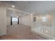 Upstairs loft area with plush carpet and lots of natural light at 6403 Ava Ridge Ave, Las Vegas, NV 89141