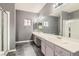 Spacious bathroom with double sink vanity and a shower at 7267 W Mesa Vista Ave, Las Vegas, NV 89113