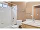 This bathroom features a shower/tub combo, a toilet, and a vanity with a sink and mirror at 7267 W Mesa Vista Ave, Las Vegas, NV 89113