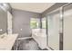 Comfortable bathroom featuring a soaking tub and separate shower at 7267 W Mesa Vista Ave, Las Vegas, NV 89113