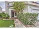 Front Entrance with well-maintained landscape and cozy entrance at 7267 W Mesa Vista Ave, Las Vegas, NV 89113