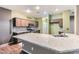 Spacious kitchen featuring granite countertops and modern appliances at 7267 W Mesa Vista Ave, Las Vegas, NV 89113