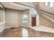 Front entry featuring a large window and staircase at 7267 W Mesa Vista Ave, Las Vegas, NV 89113