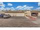 Image of street-facing garages in a townhome community with ample parking space at 768 Lawrence Dr, Henderson, NV 89015