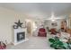 Spacious living room features fireplace, dining area, and comfortable furnishings at 768 Lawrence Dr, Henderson, NV 89015