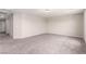 Spacious bedroom featuring neutral paint, carpet, and a ceiling light fixture at 7733 Rosebark Cliffs St, North Las Vegas, NV 89084