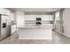 Spacious kitchen with stainless steel appliances, granite countertops and ample storage at 7733 Rosebark Cliffs St, North Las Vegas, NV 89084