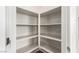 Well-organized pantry with multiple shelves for ample storage space at 7733 Rosebark Cliffs St, North Las Vegas, NV 89084