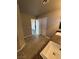 Bathroom features a dual sink vanity with granite countertop and tile flooring at 8116 Russell Creek Ct, Las Vegas, NV 89139