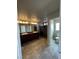 Bathroom features a dual sink vanity, a large mirror, and a shower with glass door at 8116 Russell Creek Ct, Las Vegas, NV 89139