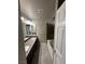 Bathroom features a dual sink vanity, a mirror, and a shower over tub combo at 8116 Russell Creek Ct, Las Vegas, NV 89139