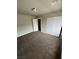 Bedroom with neutral carpet, paint, and trim and large closets at 8116 Russell Creek Ct, Las Vegas, NV 89139
