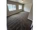 This carpeted bedroom offers a comfortable atmosphere with a lot of natural light at 8116 Russell Creek Ct, Las Vegas, NV 89139