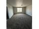 Bonus room features new carpeting, neutral paint, and bright window at 8116 Russell Creek Ct, Las Vegas, NV 89139