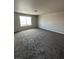 Spacious bonus room features new carpeting, neutral paint and natural light at 8116 Russell Creek Ct, Las Vegas, NV 89139