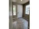 Bright entryway with tile flooring, a white door, and ample natural light at 8116 Russell Creek Ct, Las Vegas, NV 89139