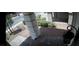 Front porch with paver flooring, stone columns, and a hanging lantern at 8116 Russell Creek Ct, Las Vegas, NV 89139