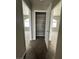 Bedroom hallway view of open linen closet with six shelves for maximum storage at 8116 Russell Creek Ct, Las Vegas, NV 89139