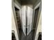 A pantry with wire shelves behind white double doors offers organized storage at 8116 Russell Creek Ct, Las Vegas, NV 89139