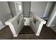 Carpeted stairwell with windows and neutral paint at 8116 Russell Creek Ct, Las Vegas, NV 89139