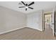 Clean bedroom with ceiling fan, and sliding-door closet at 8513 Festival Dr, Las Vegas, NV 89134