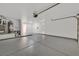 Spacious garage with epoxy floor coating and ample storage or parking space at 8513 Festival Dr, Las Vegas, NV 89134