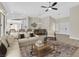 Stylishly furnished living area with open layout, adjacent to dining and kitchen at 8513 Festival Dr, Las Vegas, NV 89134