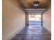 Empty garage with open door at 8717 Tom Noon Ave # 101, Las Vegas, NV 89178