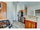 Kitchen featuring stainless steel appliances, wood cabinets, and light countertops at 8717 Tom Noon Ave # 101, Las Vegas, NV 89178