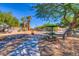 Community park featuring mature trees, walking paths and picnic benches for residents to enjoy on a sunny day at 8717 Tom Noon Ave # 101, Las Vegas, NV 89178