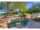 Community park featuring lush trees, picnic benches and well-maintained landscaping at 8717 Tom Noon Ave # 101, Las Vegas, NV 89178