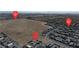 An aerial view of the property showing its proximity to the desert landscape at 9570 Thistle Creek Ave, Las Vegas, NV 89178