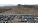 An aerial view of the community showcasing surrounding desert landscape and nearby homes at 9570 Thistle Creek Ave, Las Vegas, NV 89178