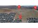 This aerial view showcases the new neighborhood and the surrounding desert landscape with beautiful mountain views at 9570 Thistle Creek Ave, Las Vegas, NV 89178