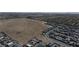 A high-angle aerial view of the community highlighting the landscape and surrounding homes at 9570 Thistle Creek Ave, Las Vegas, NV 89178