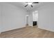 Bedroom features hardwood floors and two entryways for easy access and flow at 9570 Thistle Creek Ave, Las Vegas, NV 89178